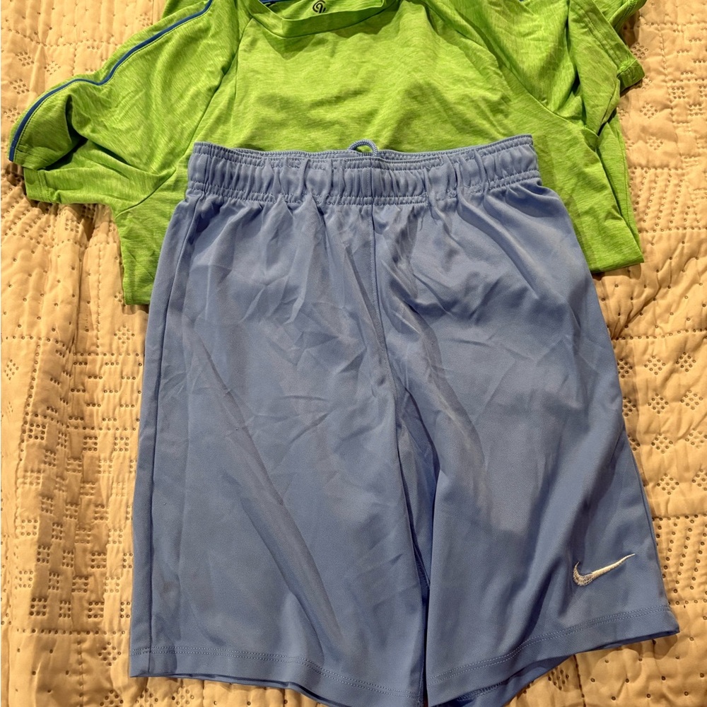 Nike Kids Light Blue Sports Shorts and Green athletic shirt